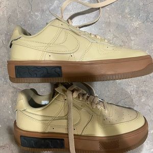 Size7. Nike cream color.